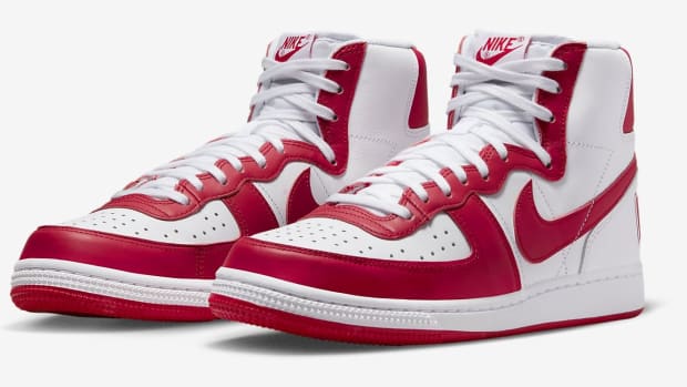 Side view of red and white Nike Terminator shoes.